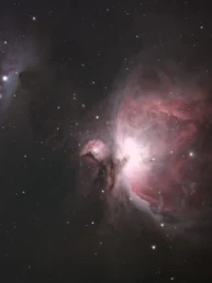 Orion Nebula (M42) astrophotography showing glowing hydrogen gas and the bright stellar core in the Orion constellation.