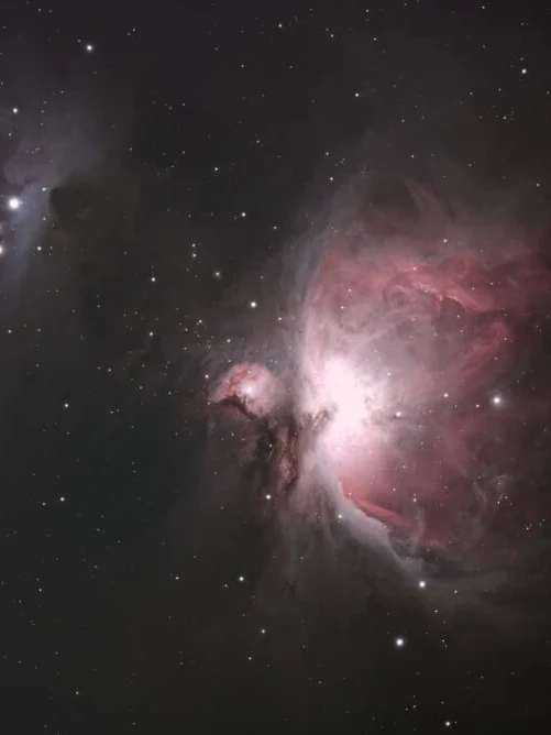 Orion Nebula (M42) astrophotography showing glowing hydrogen gas and the bright stellar core in the Orion constellation.