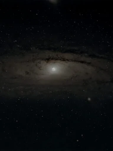 Andromeda Galaxy (M31) astrophotography showing the bright galactic core and spiral dust lanes in the Andromeda constellation.