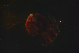 Jellyfish Nebula (IC 443) astrophotography showing glowing hydrogen gas from a supernova remnant in the constellation Gemini.