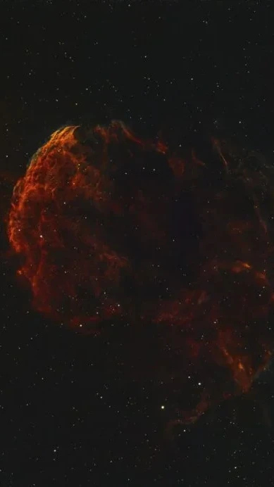 Jellyfish Nebula (IC 443) astrophotography showing glowing hydrogen gas from a supernova remnant in the constellation Gemini.