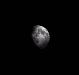 High resolution Moon astrophotography showing craters and surface detail during a waxing gibbous lunar phase against a dark sky.